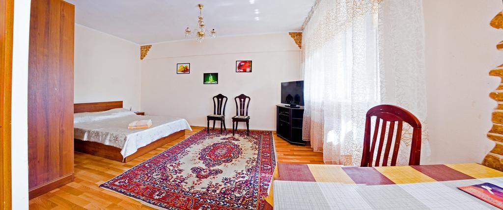 Lessor Centre Apartments Almatý Habitación foto